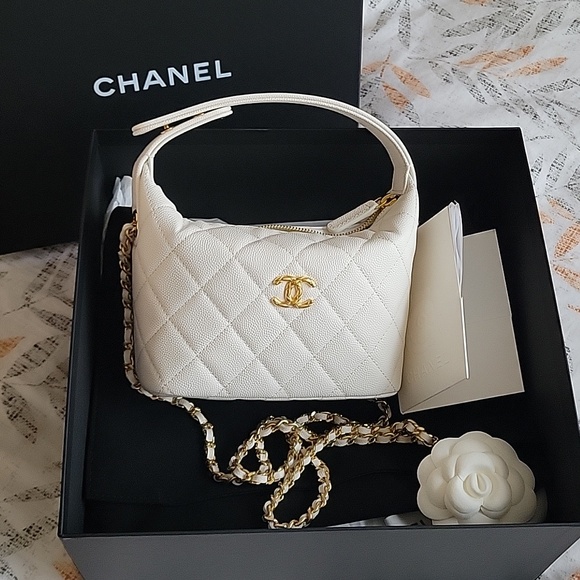 CHANEL Handbags - Chanel Ivory Quilted Clutch on Chain